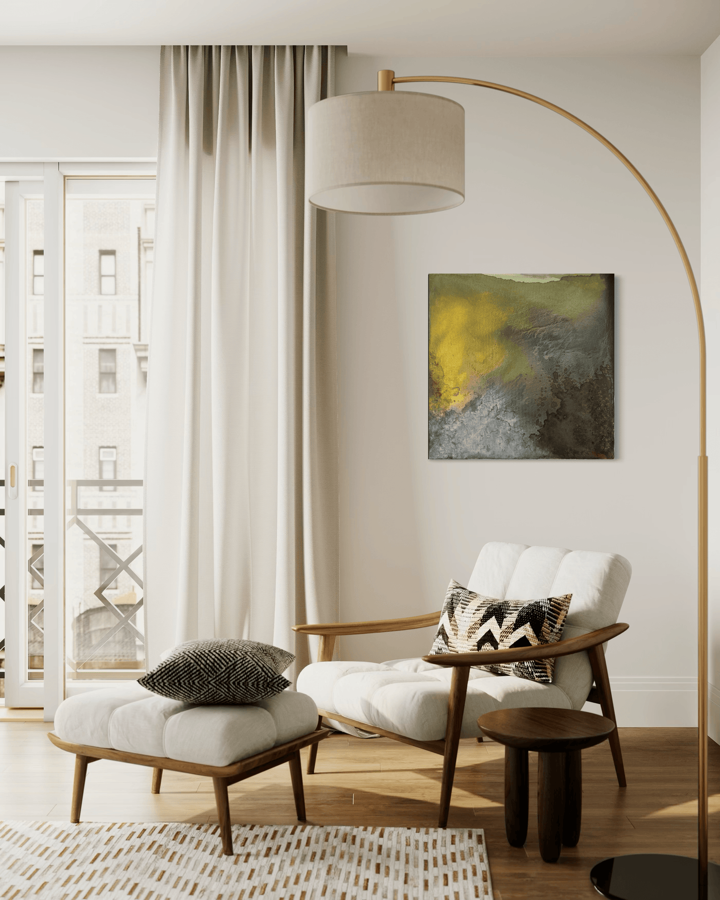 Original abstract painting with earth tones of brown, grey, green, gold and silver with layered textures and organic forms displayed above and armchair and floor lamp in a midcentury modern interior.