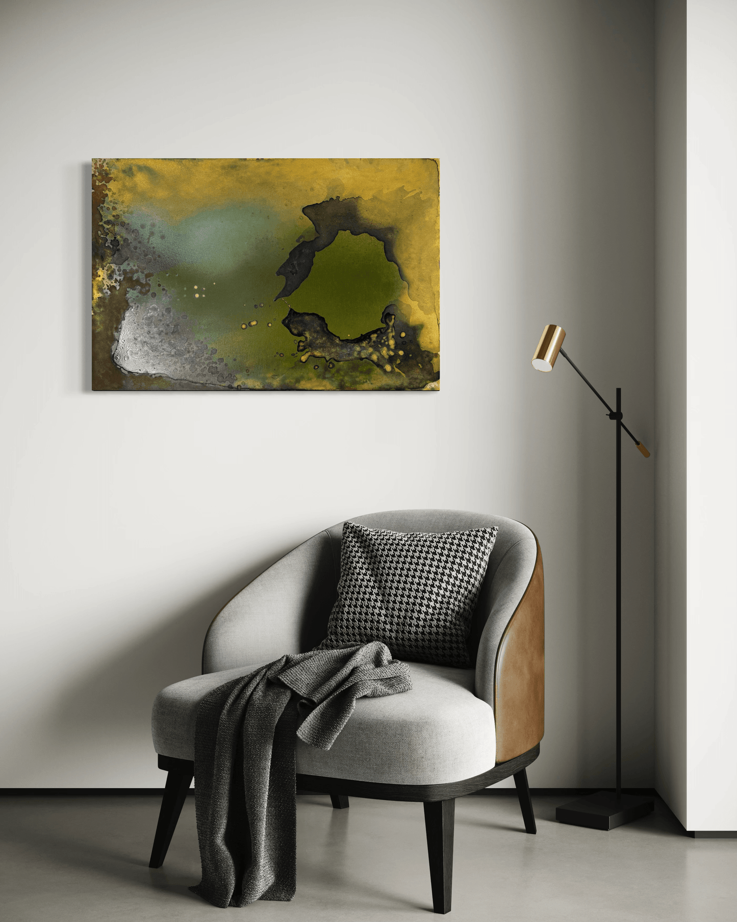 Original abstract painting in greens, yellow, gold, brown and deep wine tones with layered textures and organic forms displayed above and armchair and floor lamp in modern interior