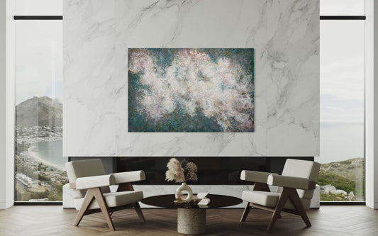 Original abstract encaustic painting has a calming feel to it with blue greens, white, pinks and gold. it creates an ethereal feeling with the what looks like a magical cloud floating by. Displayed on a marble fireplace wall in an ultra modern interior