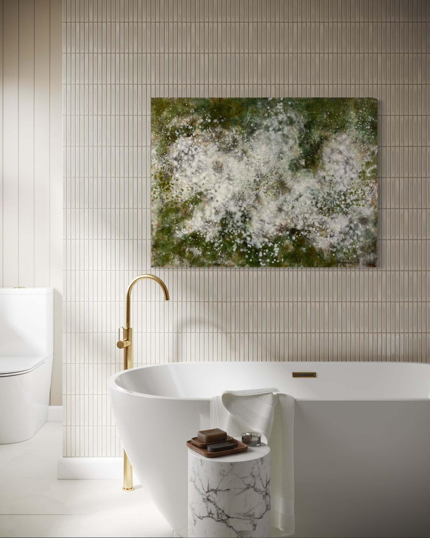 Original abstract encaustic painting with soft white and pale green cloud-like forms and layered textures on a deep rich green background. Displayed above a bathtub in a modern bathroom interior