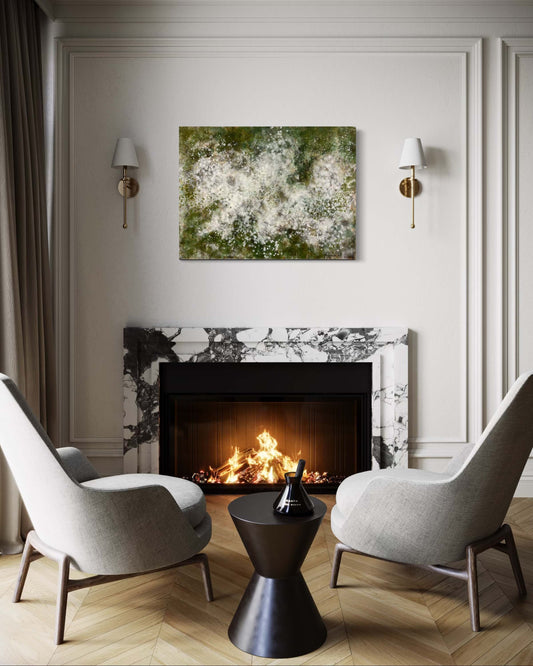 Original abstract encaustic painting with soft white and pale green cloud-like forms and layered textures on a deep rich green background. Displayed above a fireplace in a modern interior