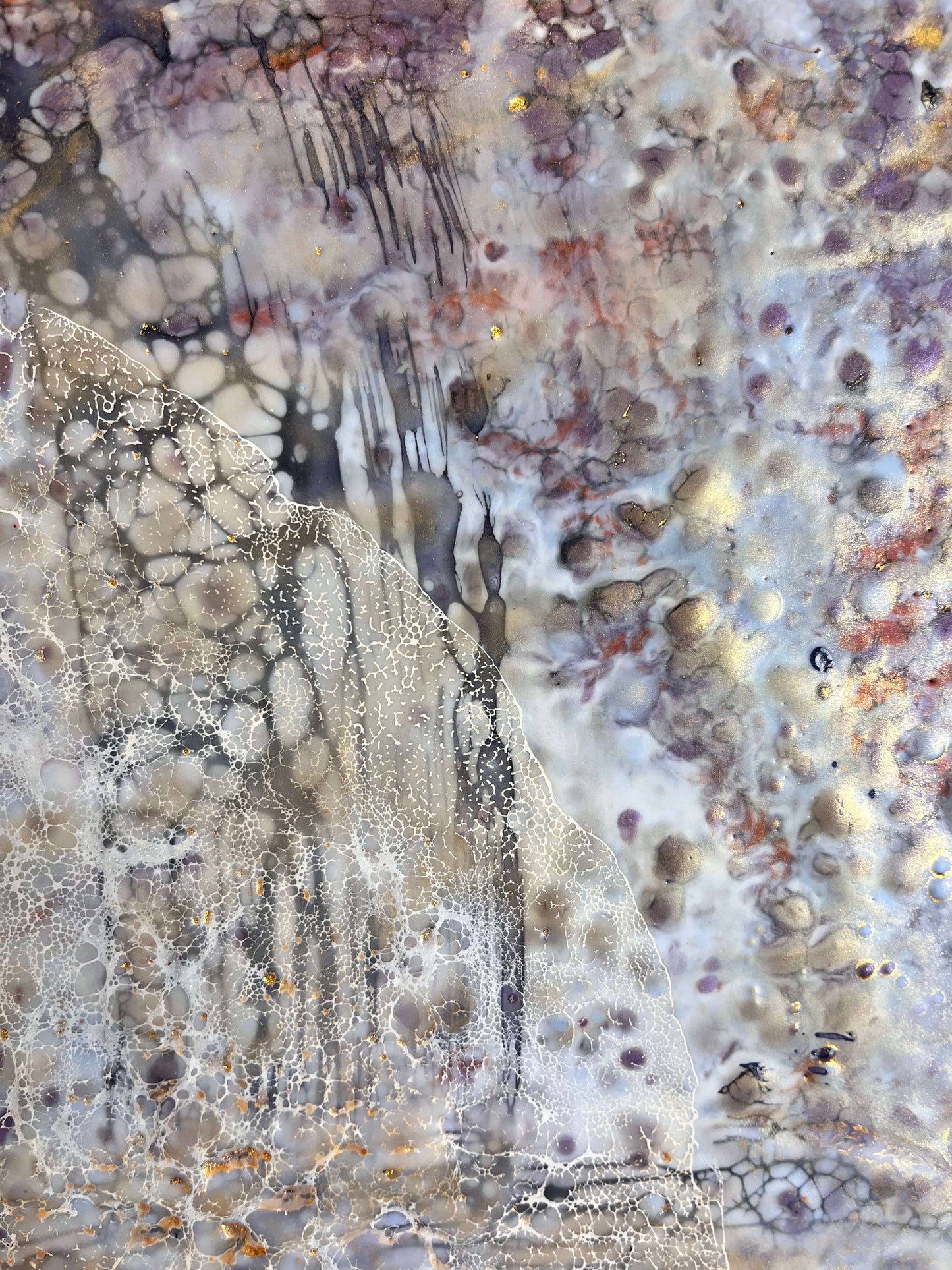 Close up.This abstract painting is created with encaustic medium. The piece is named Moonlight Moth, and the painting is done in warm grey, brown, burgundy and gold shades. It resembles the wings of a moth.