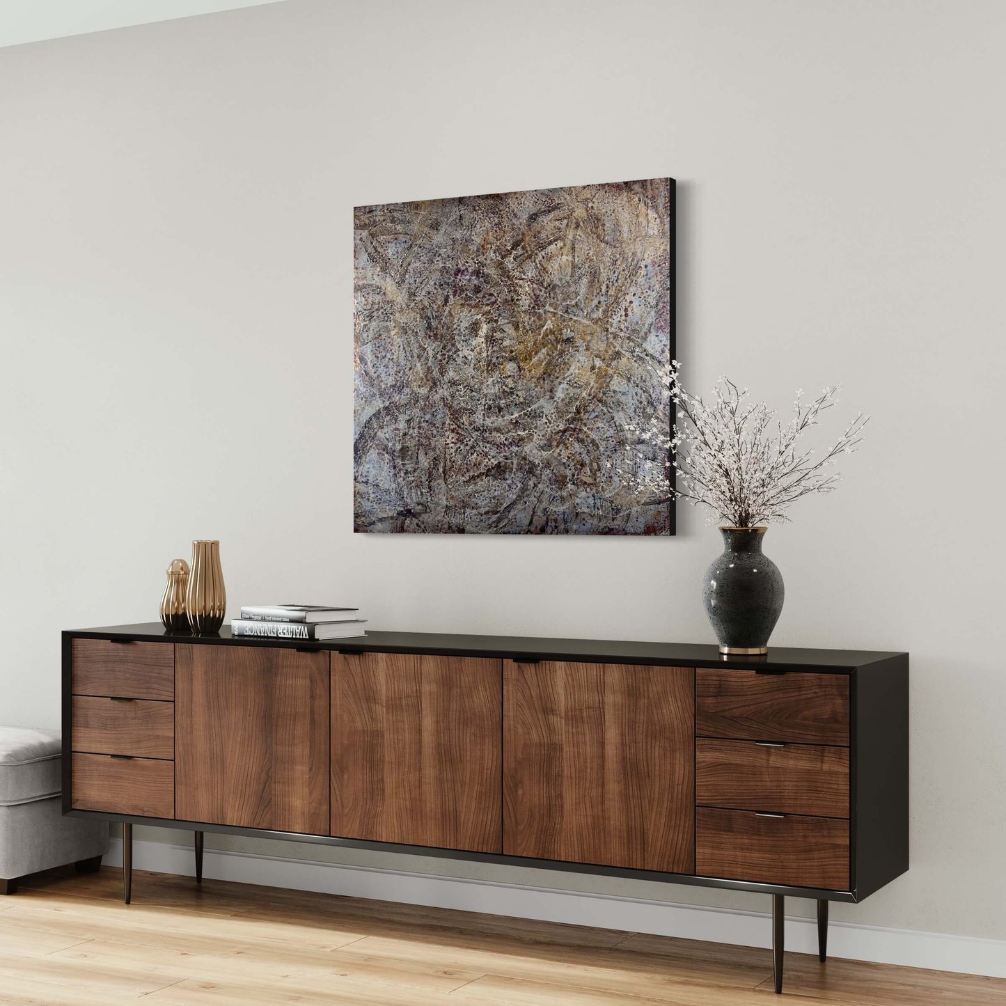 Original abstract encaustic painting in warm grey, brown, burgundy and gold with layered web-like textures in white displayed above a credenza in a modern interior