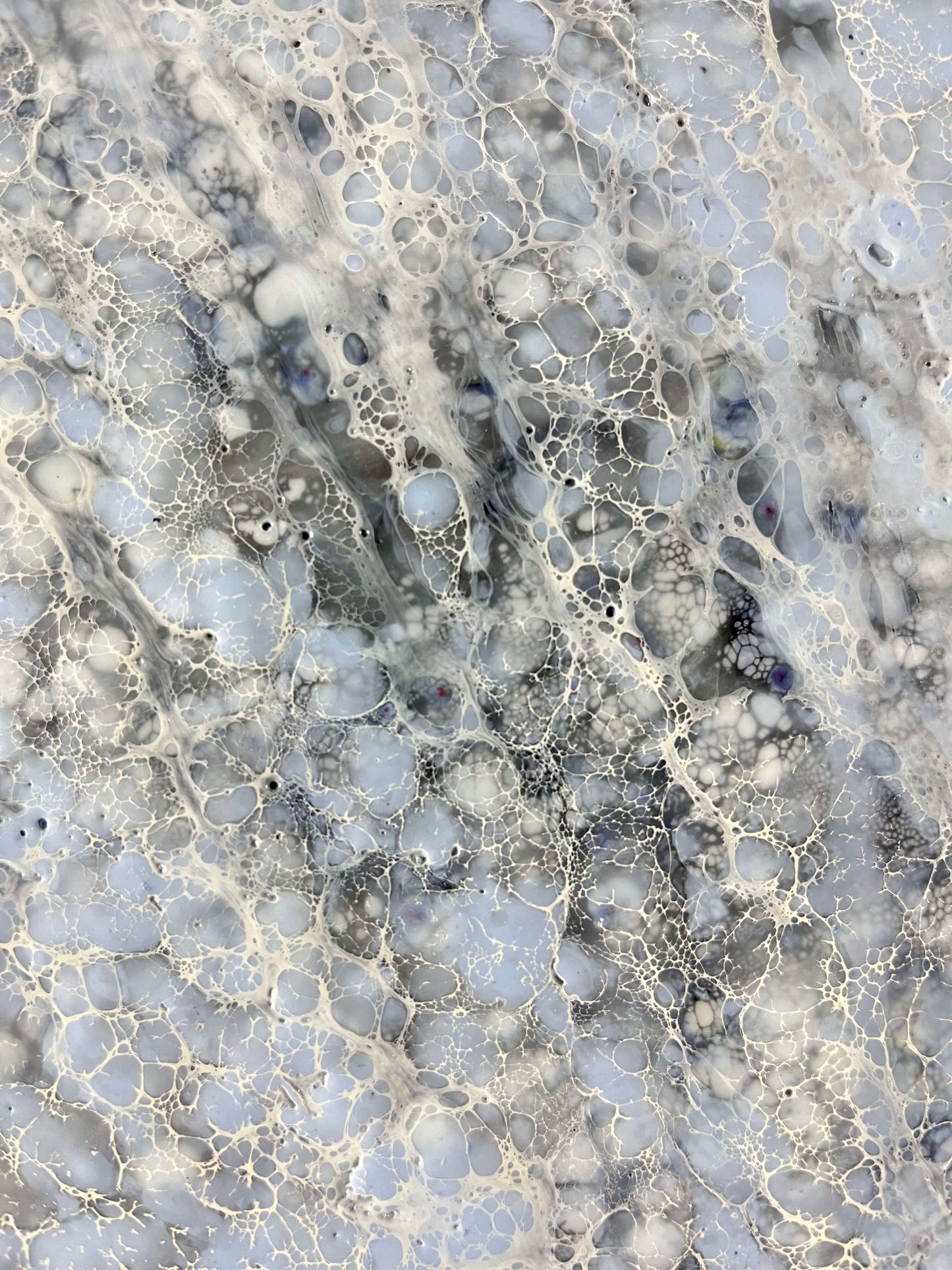 Close up.This abstract painting is done in monochromatic tones of black, grey, blue and white. It has a lot of close up juicy details. Strong directional lines make your eye go deep into the heart of a painting. This piece is 36"x36"