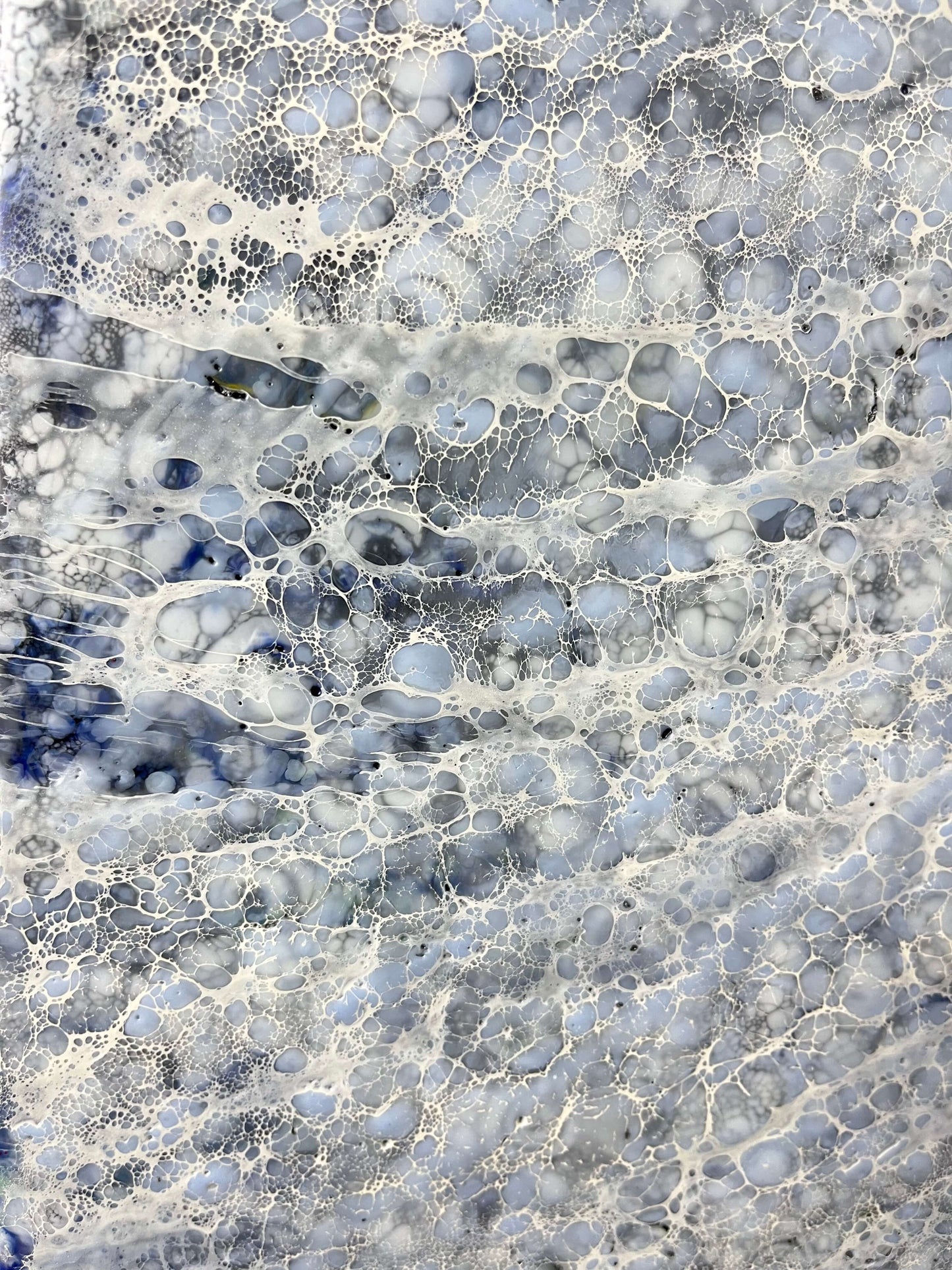 Close up.This abstract painting is done in monochromatic tones of black, grey, blue and white. It has a lot of close up juicy details. Strong directional lines make your eye go deep into the heart of a painting. This piece is 36"x36"