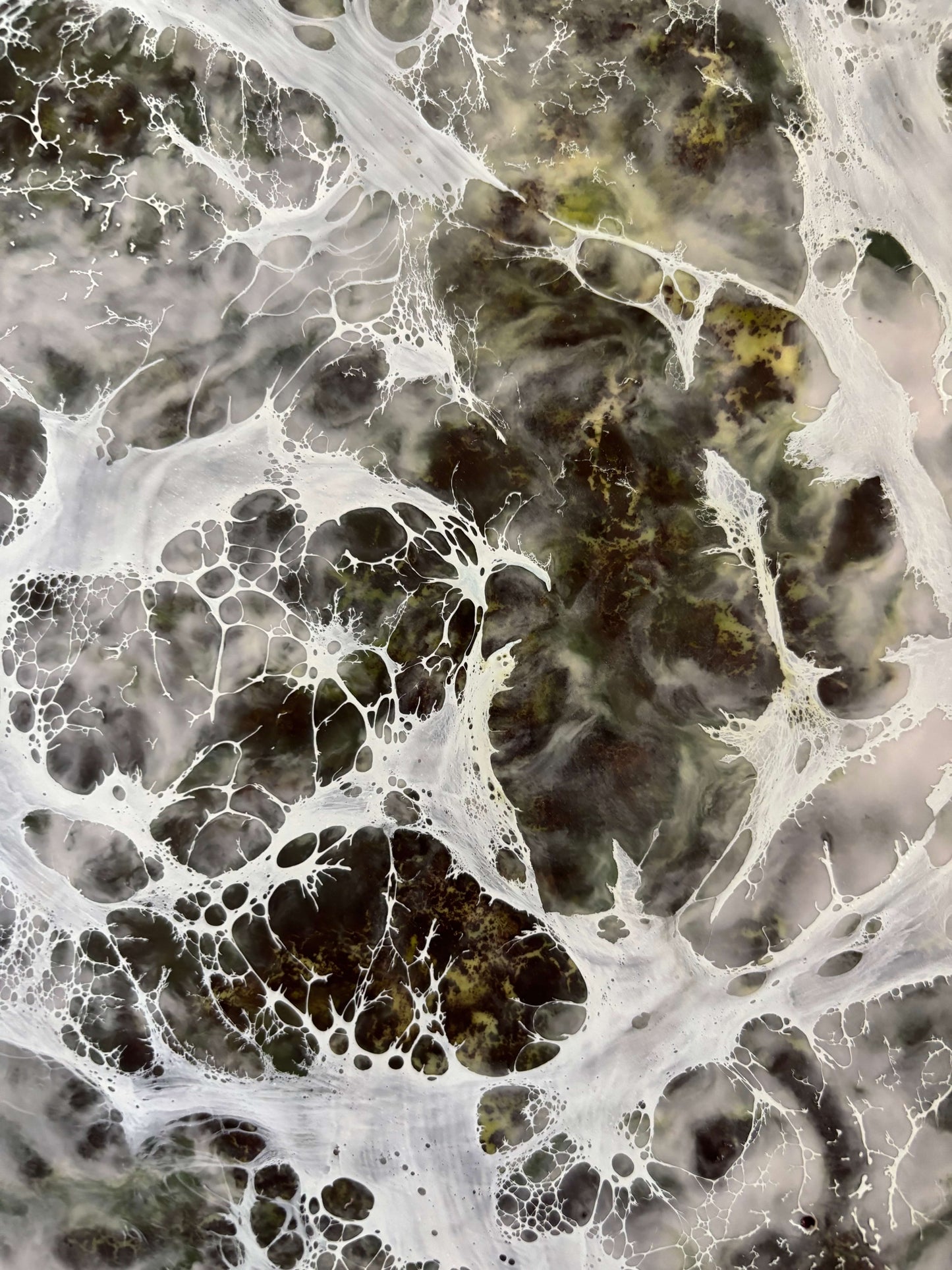 Close up.Abstract painting with layered earthy browns and whites, resembling delicate web-like veils or flowing tears across the surface