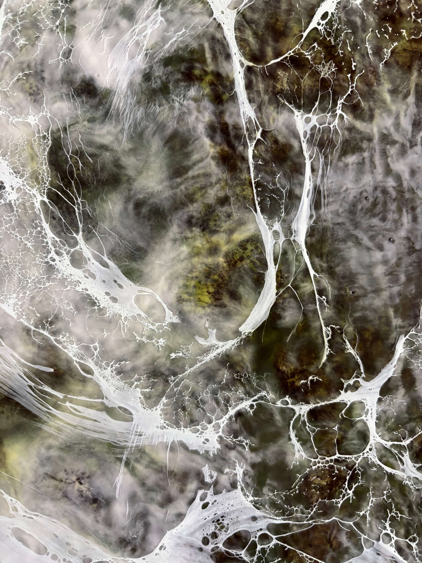 Close up.Abstract painting with layered earthy browns and whites, resembling delicate web-like veils or flowing tears across the surface