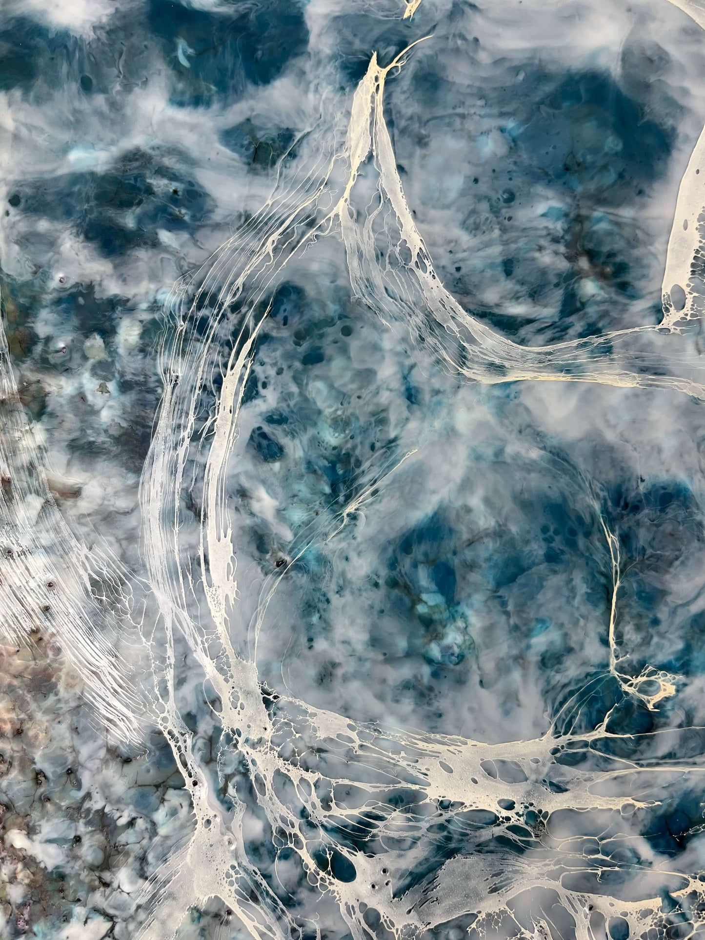 Close up.This abstract painting is one of the pair and it is inspired by a song written by Otis Redding. The painting is done in moody blues, whites and it has flow and movement to it to represent the movement of water