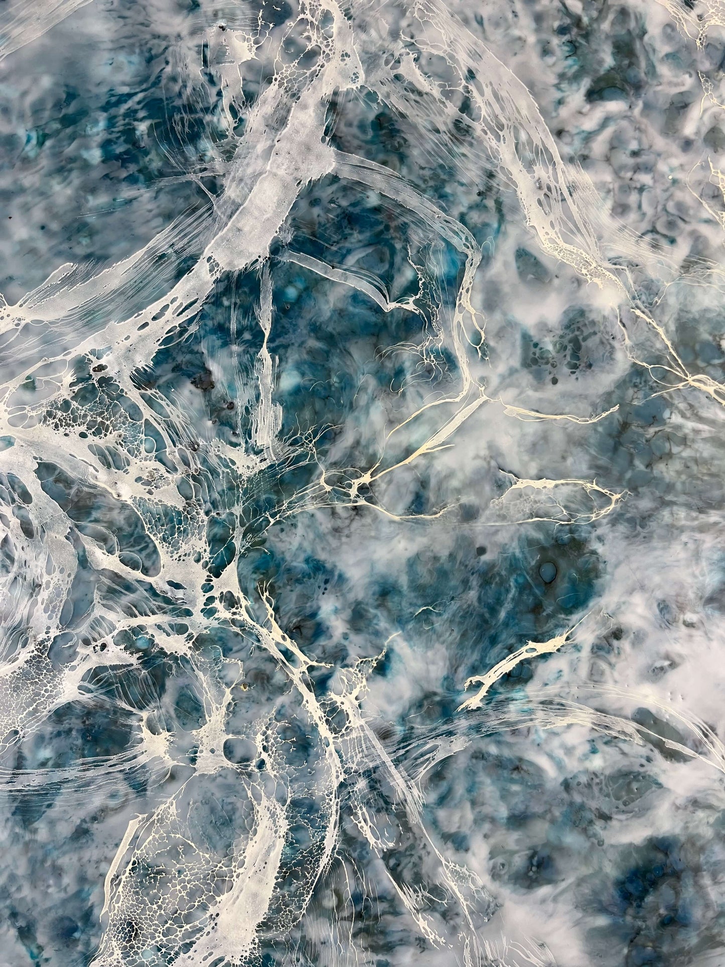 Close up.This abstract painting is one of the pair and it is inspired by a song written by Otis Redding. The painting is done in moody blues, whites and it has flow and movement to it to represent the movement of water