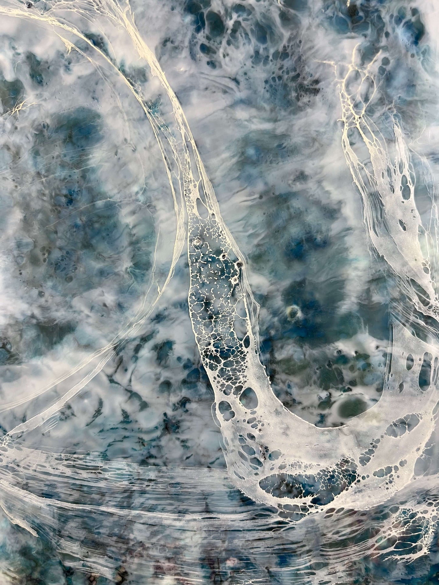 close up.This abstract painting is one of the pair and it is inspired by a song written by Otis Redding. The painting is done in moody blues, whites and it has flow and movement to it to represent the movement of water