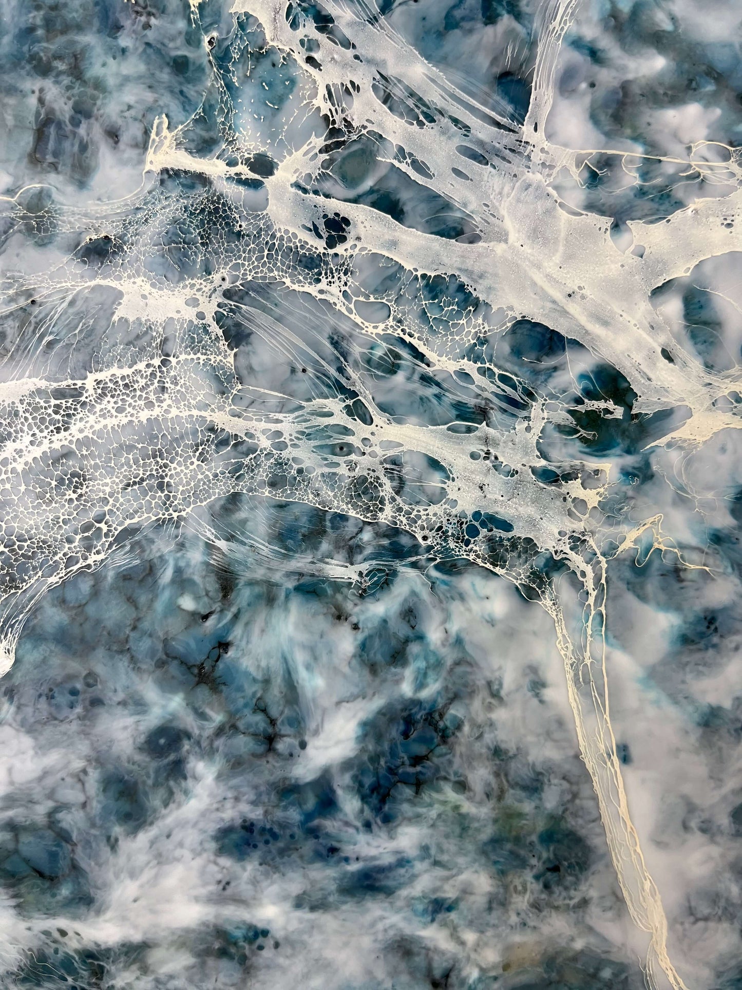 Close up.This abstract painting is one of the pair and it is inspired by a song written by Otis Redding. The painting is done in moody blues, whites and it has flow and movement to it to represent the movement of water