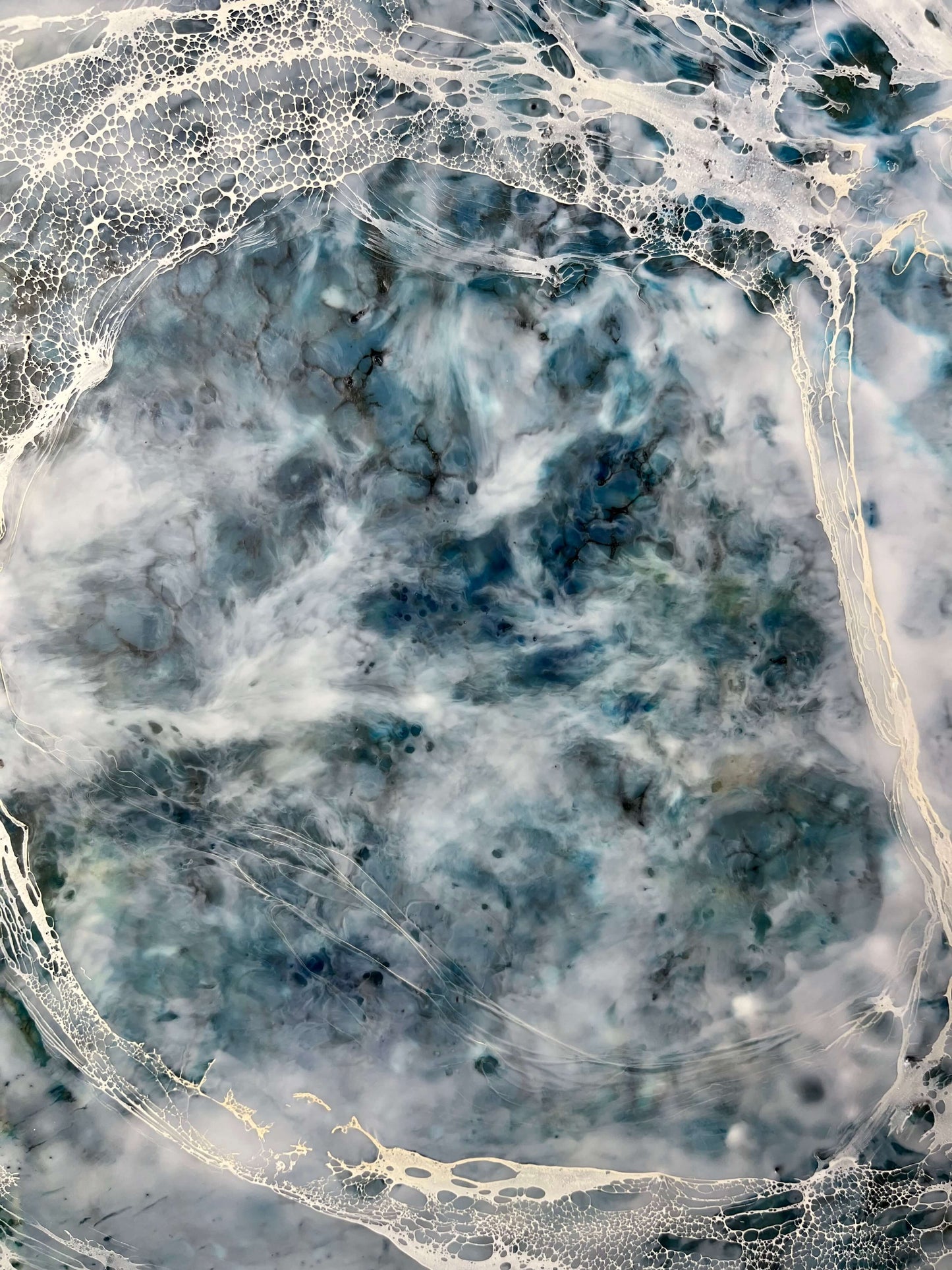 Close up.This abstract painting is one of the pair and it is inspired by a song written by Otis Redding. The painting is done in moody blues, whites and it has flow and movement to it to represent the movement of water