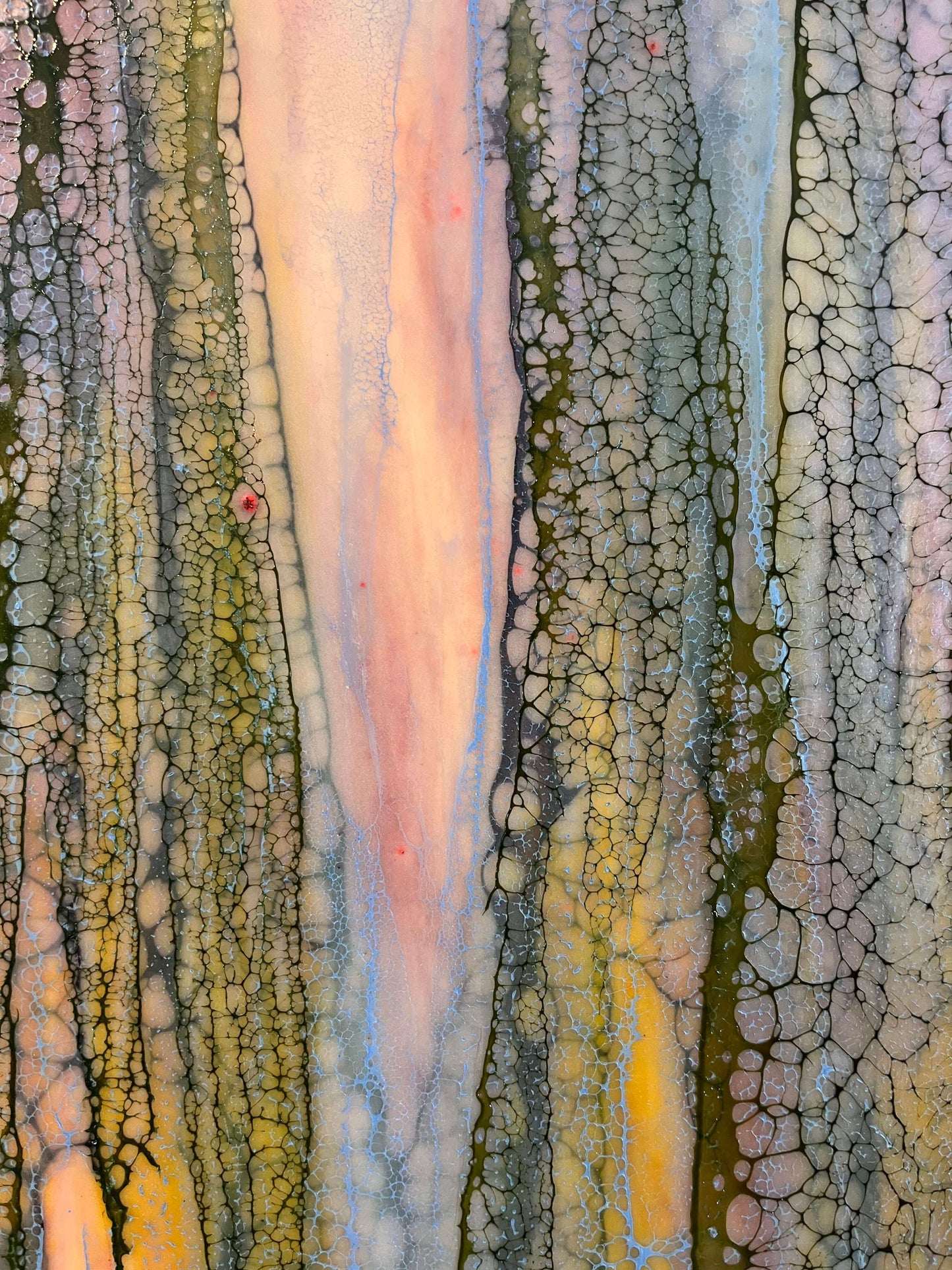 Close up.Abstract Encaustic Painting, 16x20in. Created with beeswax, damar resin, dry pigments and shellac on cradled wood panel. This painting is playful, but delicate with a gentle energy. The colours of this piece are soft pinks, periwinkle blues, majestic purples and moody greens. The delicate lace-like texture draping over the painting has this protective and enveloping effect as if the colours underneath it, while blending with each other, are shy and private. Hanging hardware is included