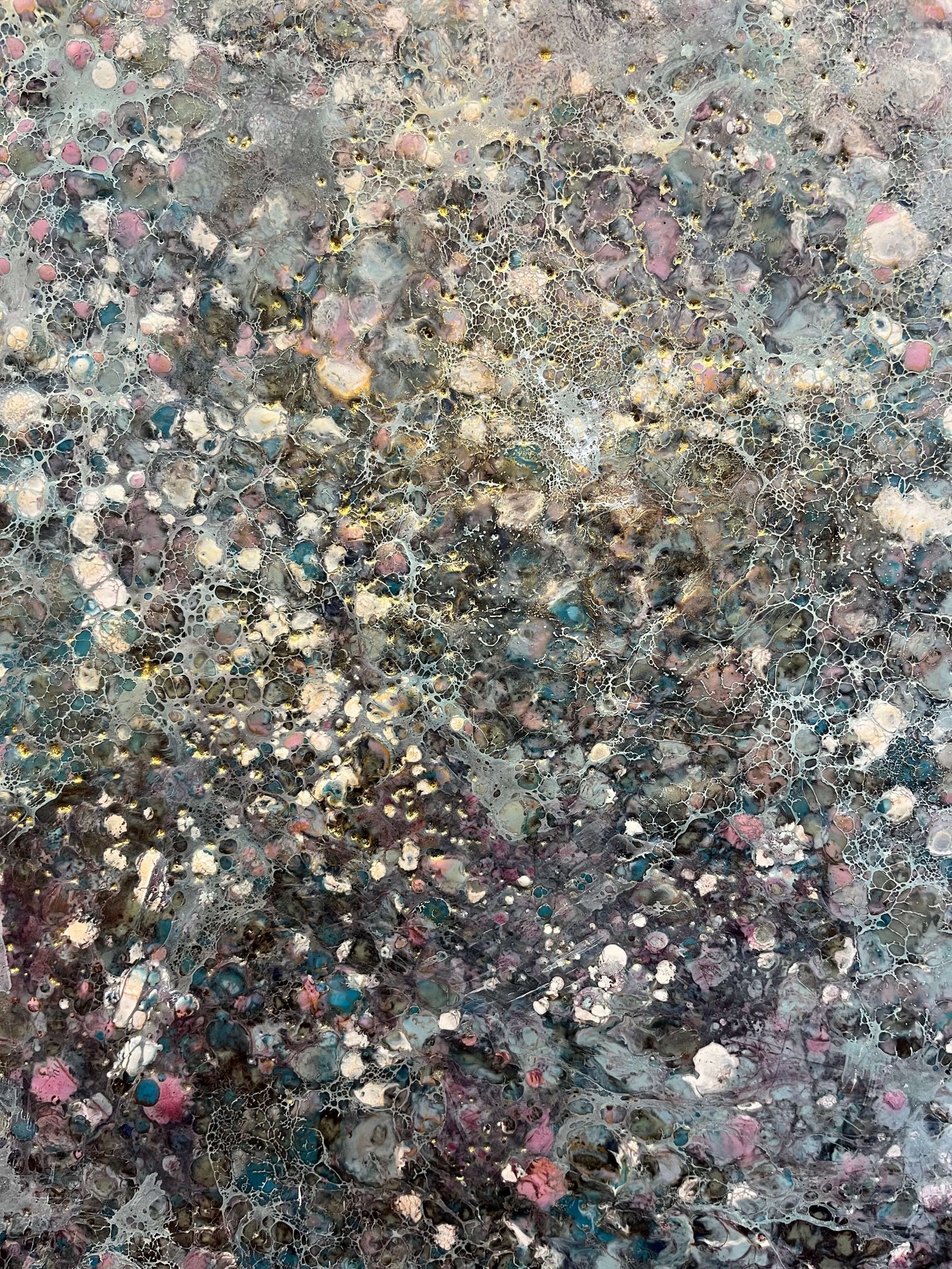 Close up.This painting has a vibrational feeling,  it resembles the glow, movement and flickering of stars and the vastness of our universe. With moody colours of black, grey, white, blues, pink and accents of gold.