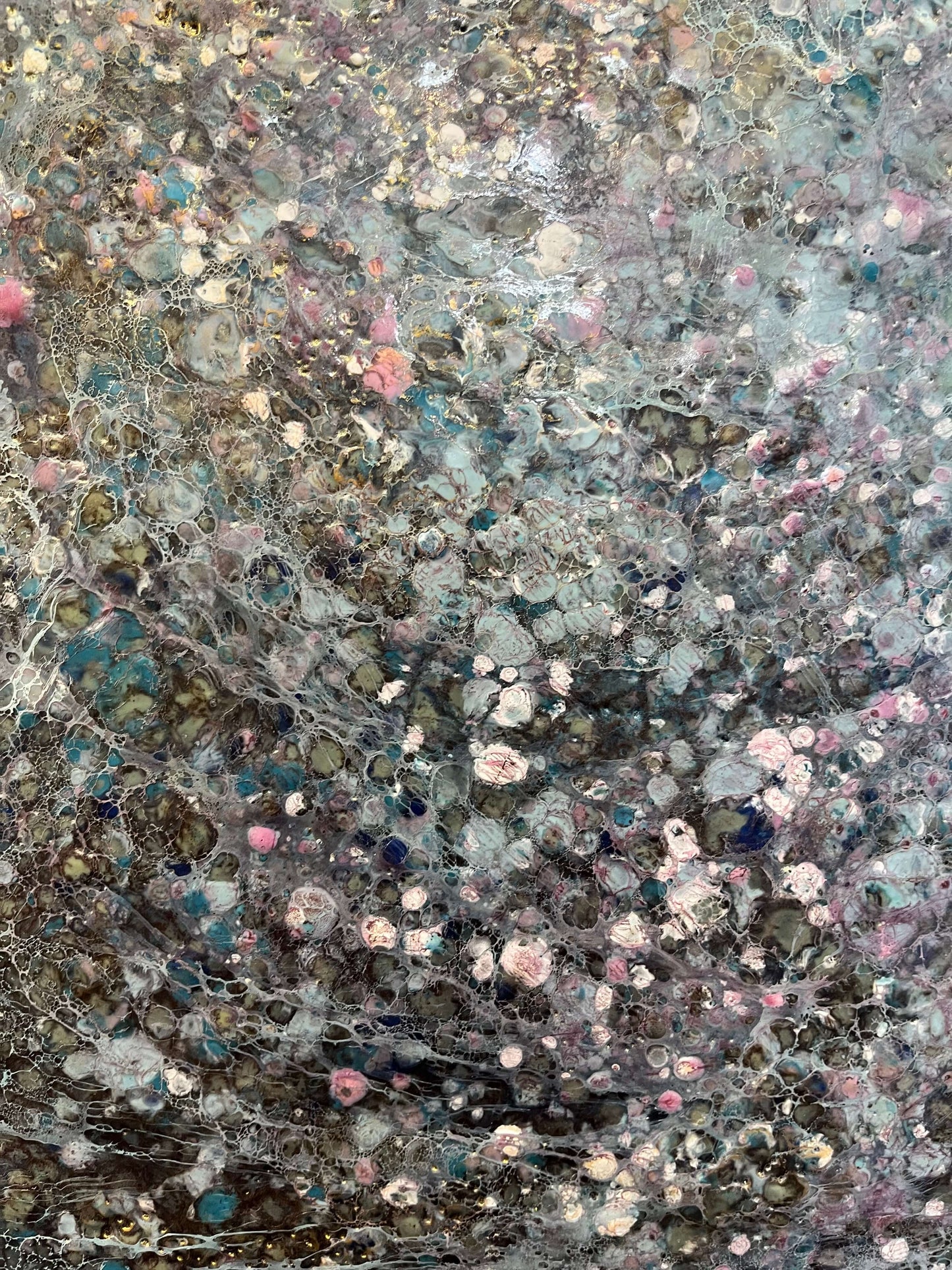 Close up.This painting has a vibrational feeling,  it resembles the glow, movement and flickering of stars and the vastness of our universe. With moody colours of black, grey, white, blues, pink and accents of gold.