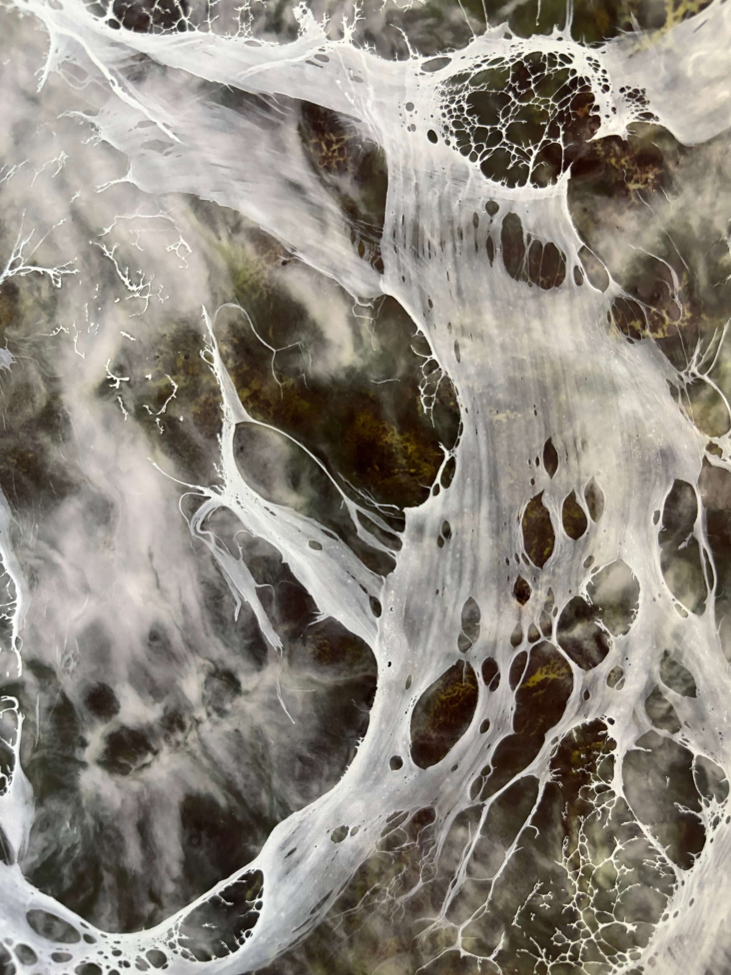 Close up.Abstract painting with layered earthy browns and whites, resembling delicate web-like veils or flowing tears across the surface